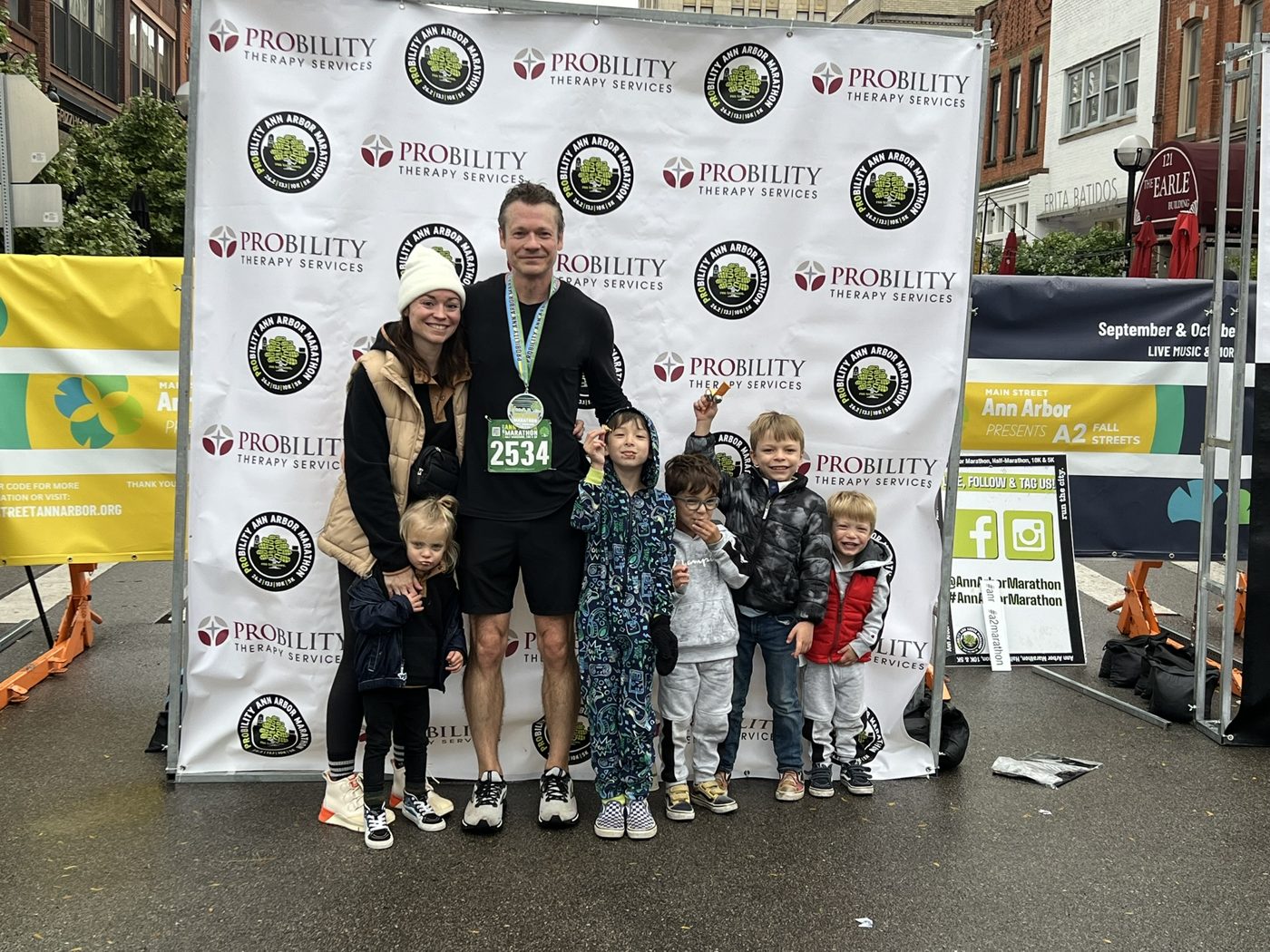 Chris Schults with his family at the Ann Arbor Marathon